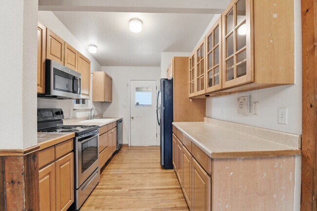 Building Photo - $2,495.95, 4 bed, 1.5 bath with a large backyard.