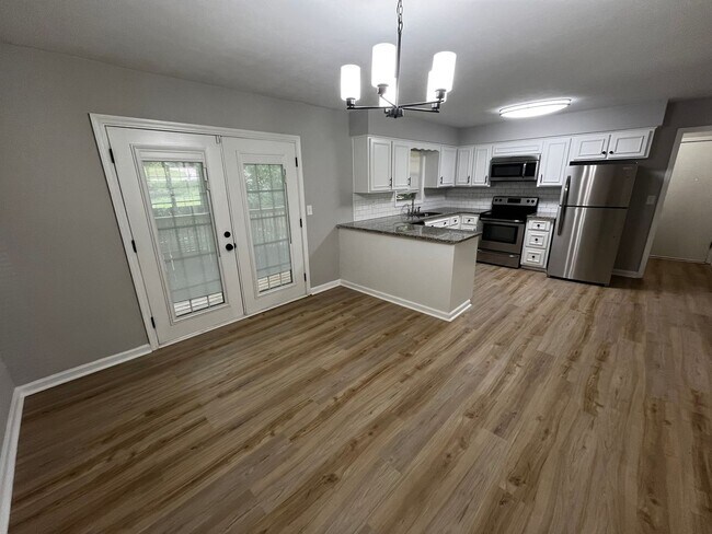 Building Photo - Must See the Sunroom off the Primary Bedroom!