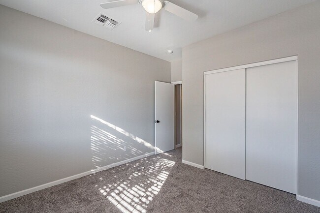 Building Photo - Fantastic home with Solar & a den!