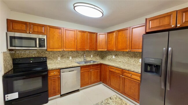 Building Photo - 1125 NW 16th Ct