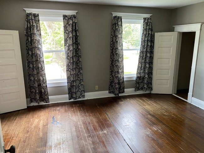 bedroom 1 with 2 large closets & 1 smaller closet - 845 Clark St