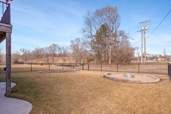 Building Photo - Waterfront Home in Buccaneer Bay with 3-Car Garage & Walkout Basement