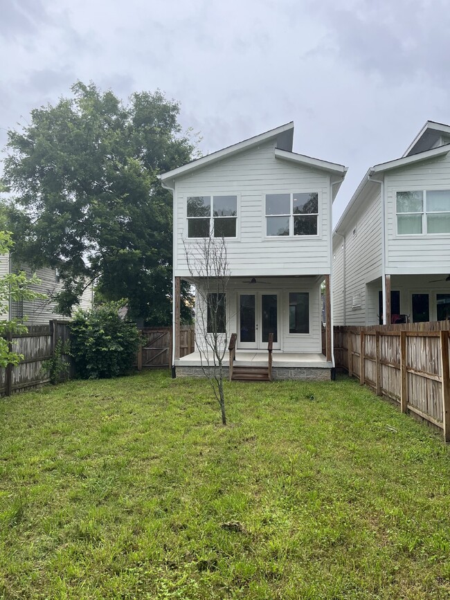 Building Photo - "Charming 4-Bedroom Nashville Oasis with E...