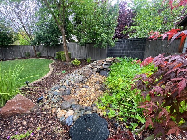 Building Photo - CLEAN AND SPACIOUS 4 BED, 2.5 BATH WITH COVERED BACK PATIO AND LUSH LANDSCAPING IN WESTLAKE COMMU...