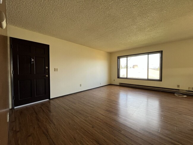 Building Photo - Spacious 3 Bedroom with Bonus Living Area, Patio & Built in Fireplace