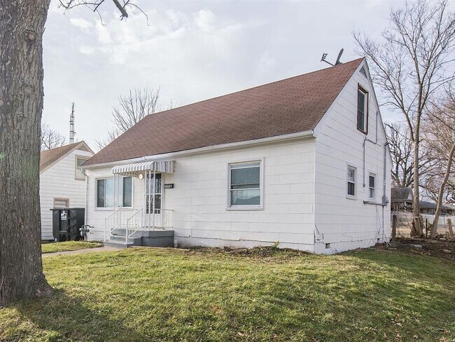 Primary Photo - Spacious 4-Bedroom, 2-Bath Home with Garag...