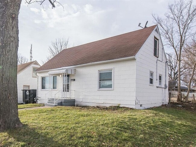 Primary Photo - Spacious 4-Bedroom, 2-Bath Home with Garage, Side Parking & Private Backyard