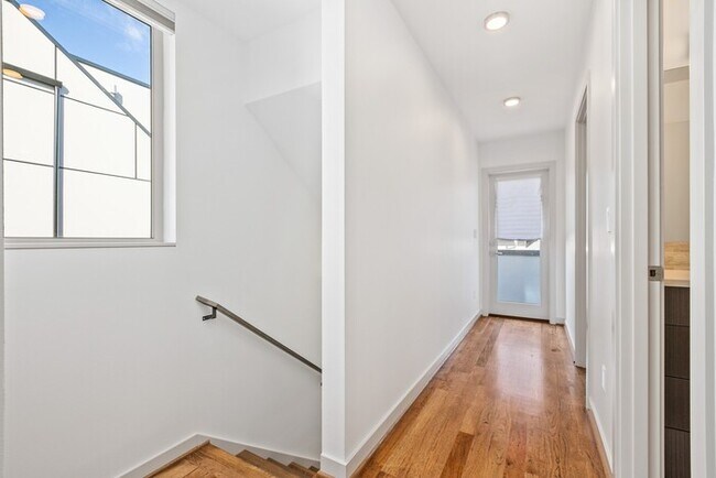 Building Photo - Impeccable Greenwood Townhome with Air Con...