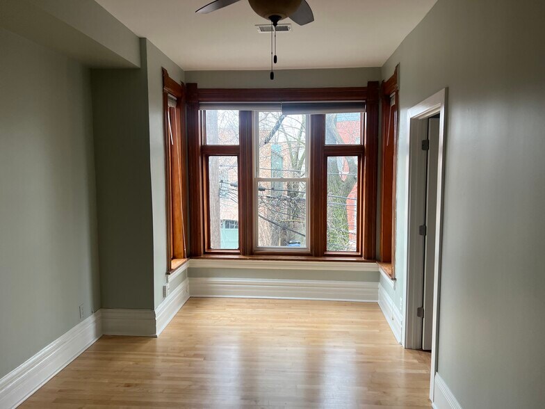 Living room and bay window, great natural light - 1235 N Marion Ct