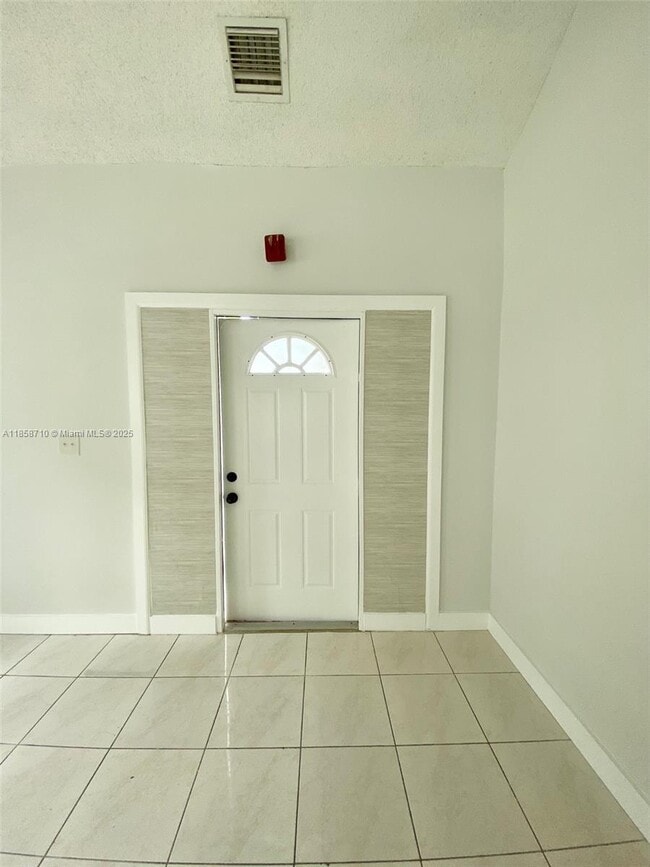 Building Photo - 3200 Coral Springs Dr