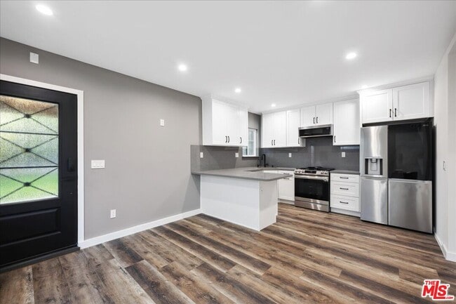 Building Photo - 9728 Kessler Ave