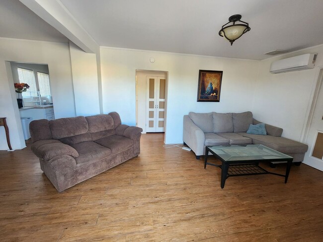 Building Photo - Coming Soon! Furnished One Bedroom with Bo...