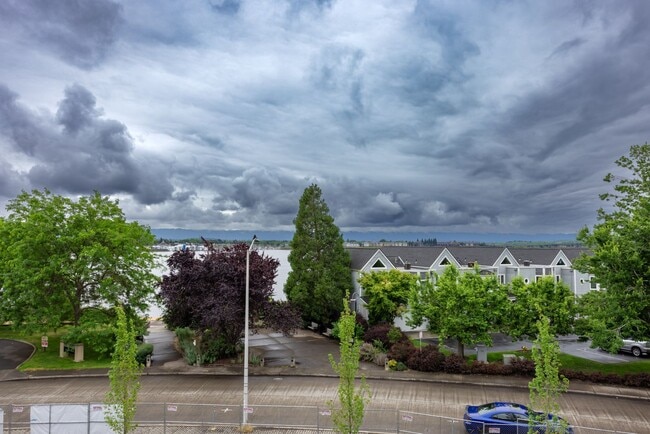 Building Photo - Riverside Townhomes - Waterfront Living in...