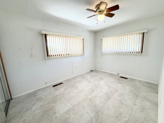 Building Photo - 10675 N Kilimanjaro Ave