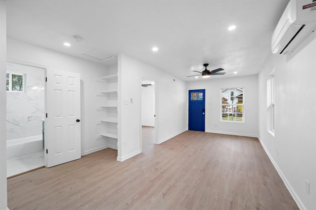 Entryway to the home with shelving. - 2312 Lucinda St