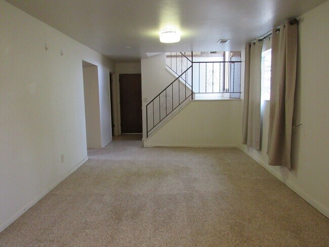 Building Photo - Spacious Bi Level home backing to open space