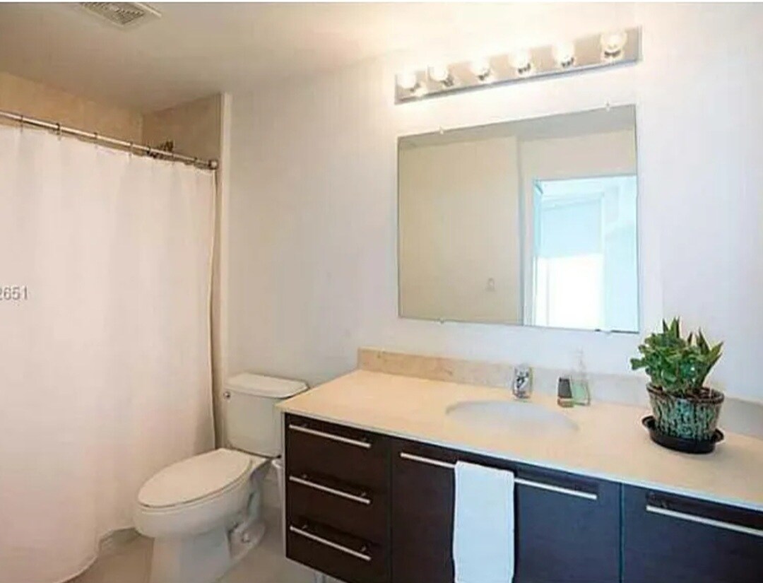 Second master private bathroom. - 1900 N Bayshore Dr