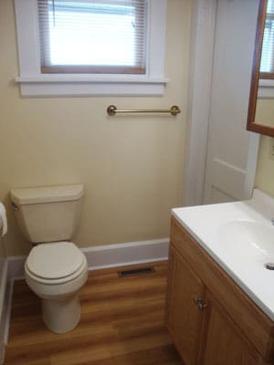 Bathroom with vanity and stool. - 512 S Center St