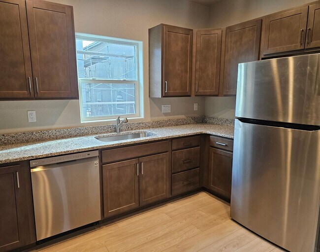 Building Photo - Unveiling Luxury Living: Townhomes with Ma...