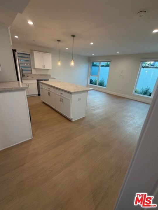 Building Photo - 5191 1/2-5191 1/2 Lindley Ave