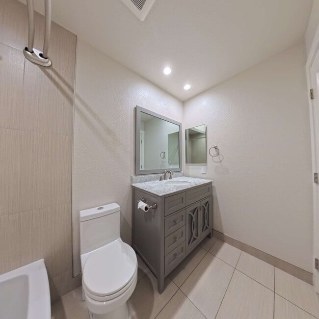 Building Photo - Highly Remodeled | Customer Closets | Gated Community