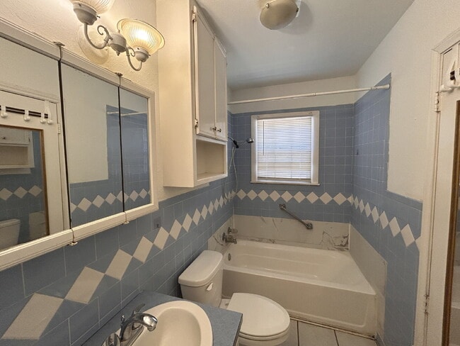Building Photo - "Charming 4-Bed, 2-Bath Home