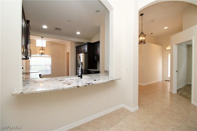 Building Photo - 15077 Cortona Way