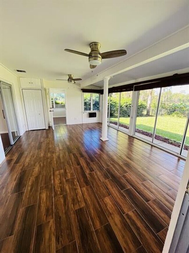 Building Photo - Eustis Lake Front Home with 2 Primary Bedr...