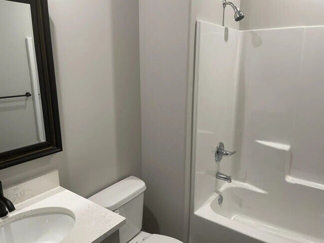 Building Photo - Single family slab home with three car garage. This home is 4 bedrooms, three bathrooms open floo...