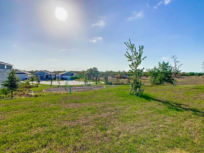 Building Photo - JUST REDUCED! PET FRIENDLY! Experience Com...