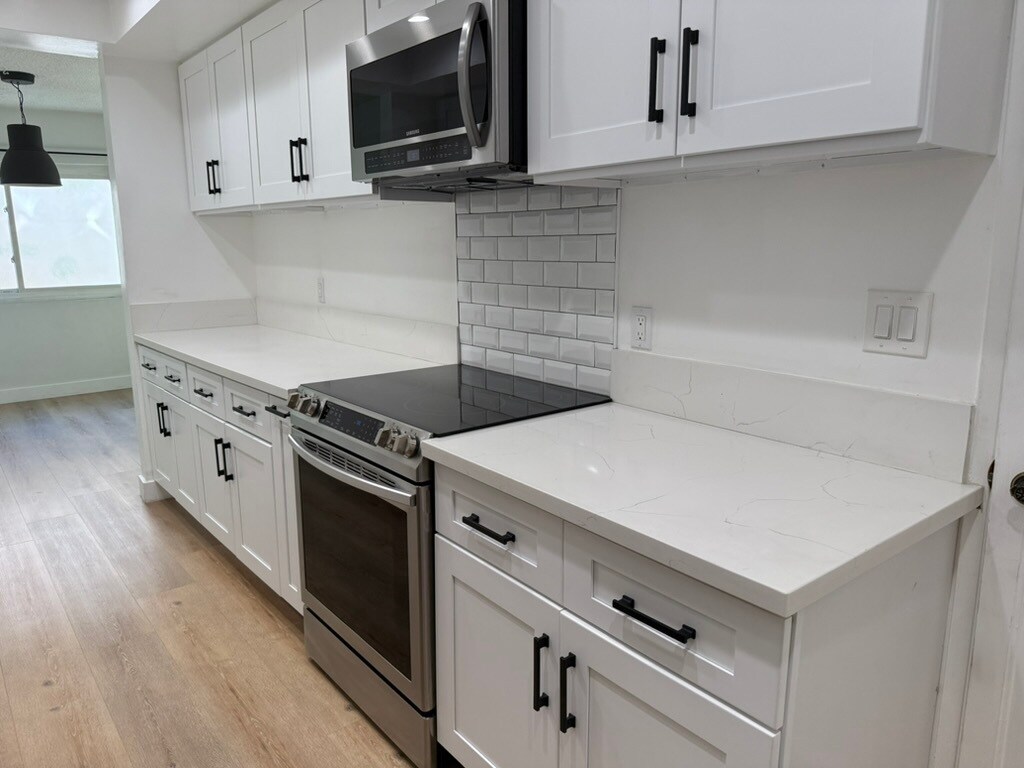 Clean modern design kitchen - 1203 N Sweetzer Ave