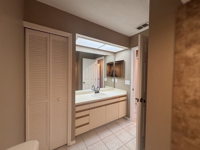 Building Photo - Coastal Luxury Awaits – 3-Story Townhome i...