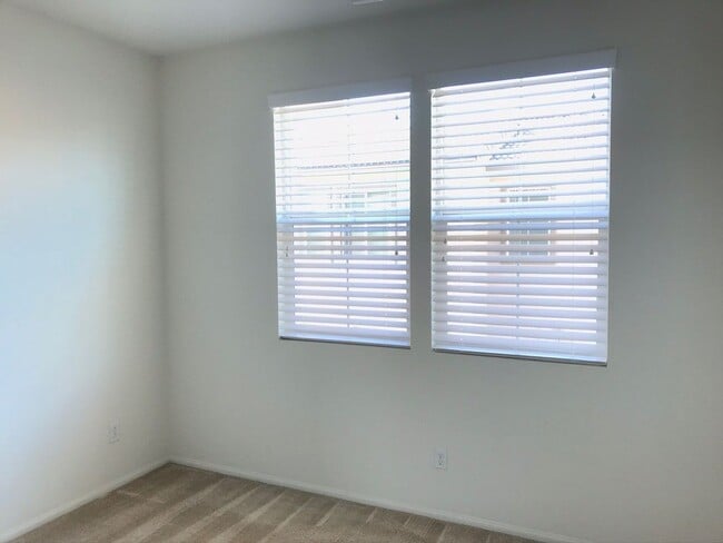 Building Photo - Beautiful 2 Bedroom Condominium with Attached Garage Located in Gated Community of Eastvale