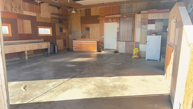 Building Photo - Spacious, four-bedroom, two-bathroom, coun...