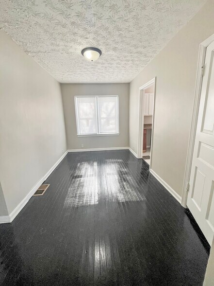 Building Photo - 1227 W 25th St