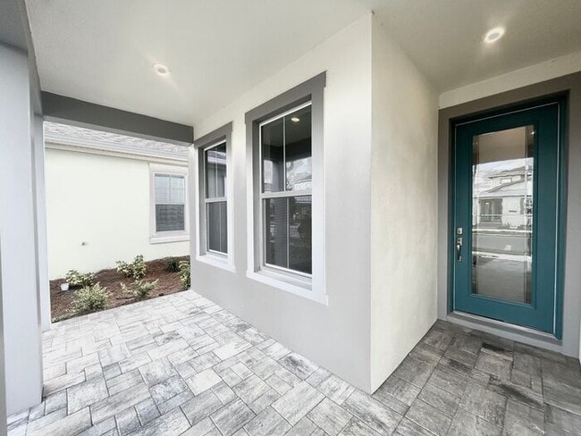 Building Photo - Gorgeous 4/3 Residence with a Private Back Lanai and a 3 Car Garage in the Delightful Laureate Pa...