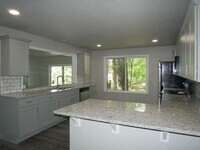 Building Photo - Gorgeous 4 bedroom, 2.5 bath House on a 1 ...