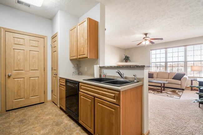 Our kitchens are designed with functionality in mind, offering plenty of counter space and storage for all your culinary needs. - Stone Ridge Estates Apartments & Duplexes