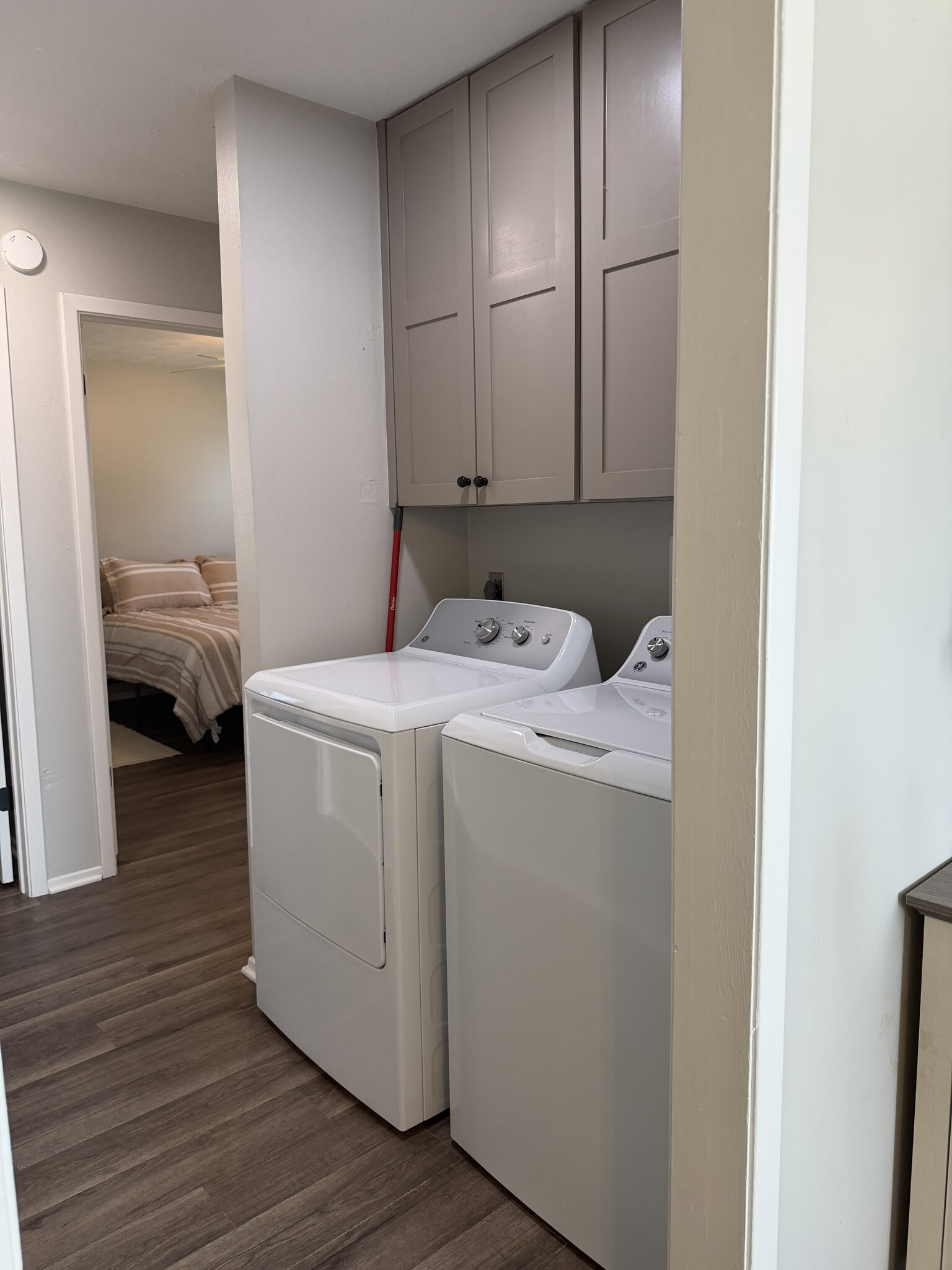 laundry area in wide hallway - 2604 N Austin Ave