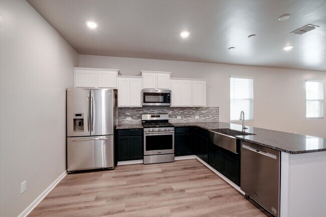 Building Photo - Solar-Powered Home with Modern Finishes & Included Fridge