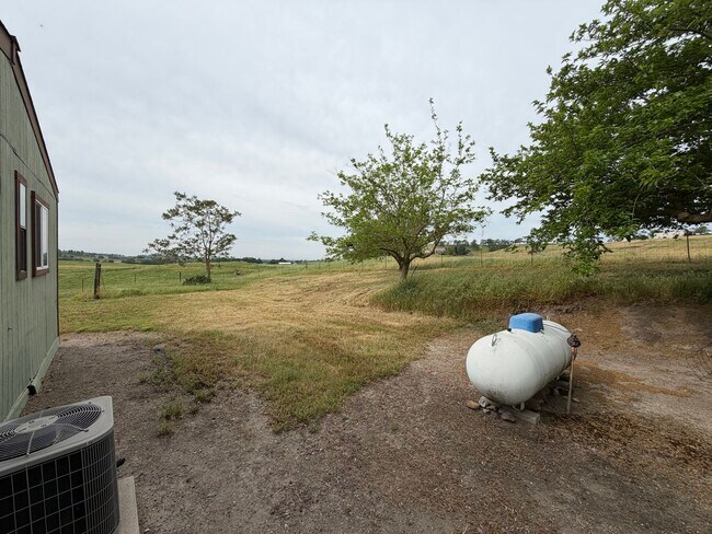 Building Photo - Secluded country home w/ 2-car garage