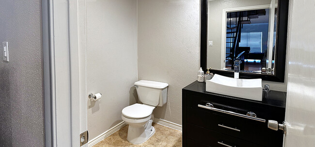 Powder room by kitchen - 8710 Park Ln