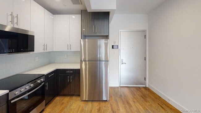 Building Photo - 138-28 Queens Blvd