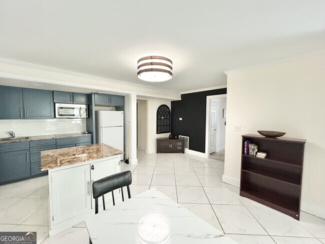 Building Photo - 6031 Ambassador Dr