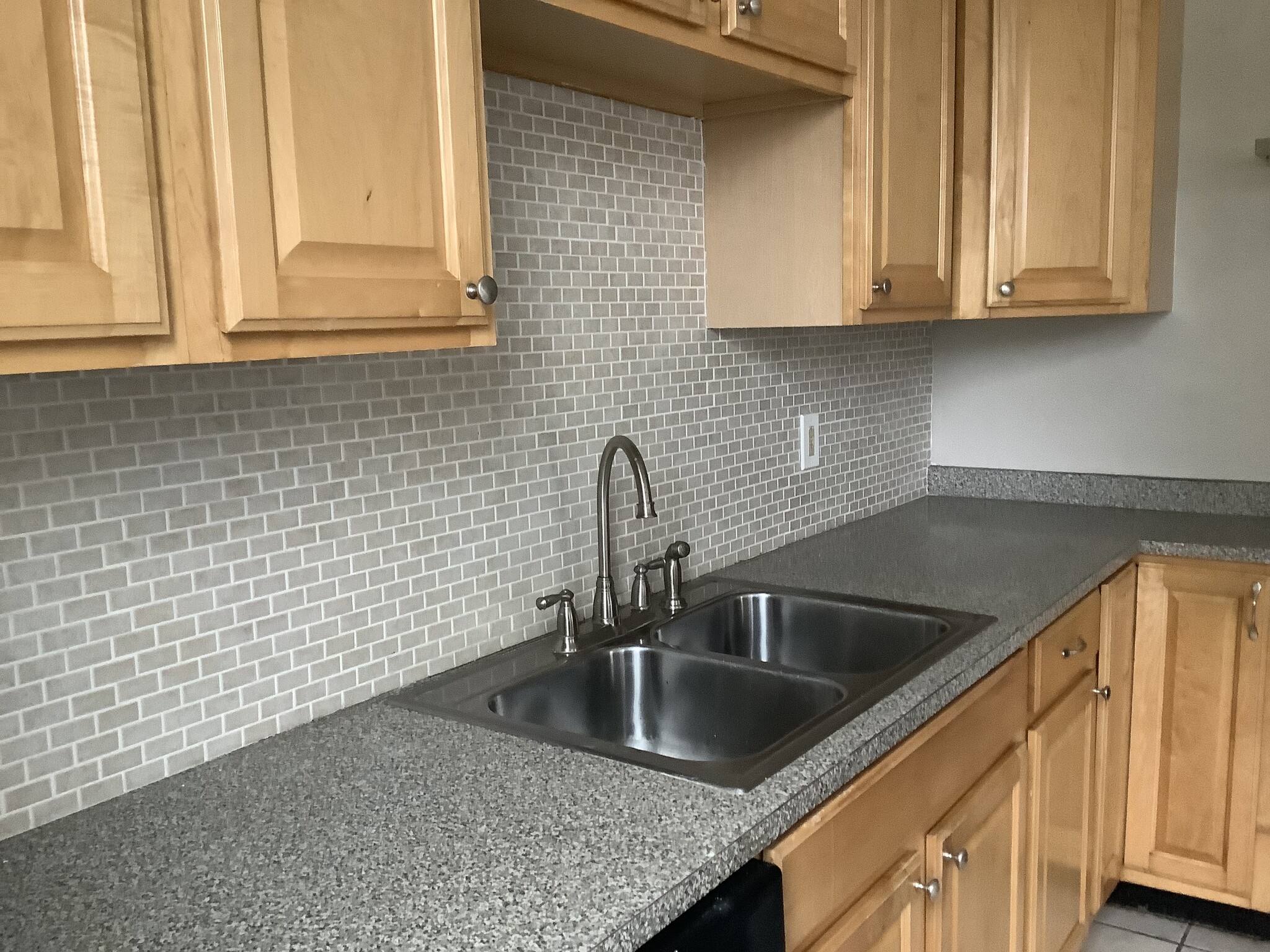 Tile backsplash and stainless steel double bowl sink. - 11 Jay St