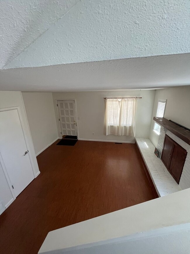 Building Photo - 4 Bedroom Gardener's Delight With Rooftop Patio, Privacy and Covered Parking