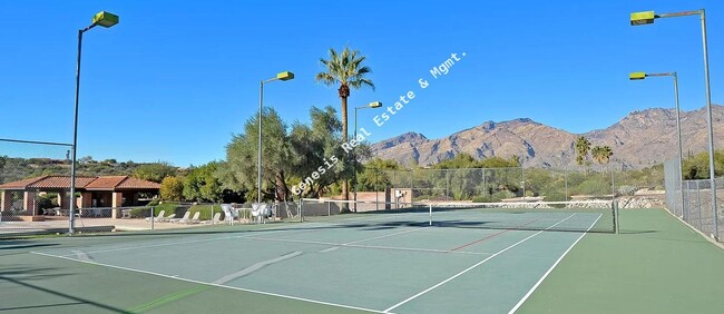 Building Photo - "Charming 2-Bed, 2-Bath Townhouse with Cozy Fireplace in Tucson's Scenic Sunrise Territory neighb...