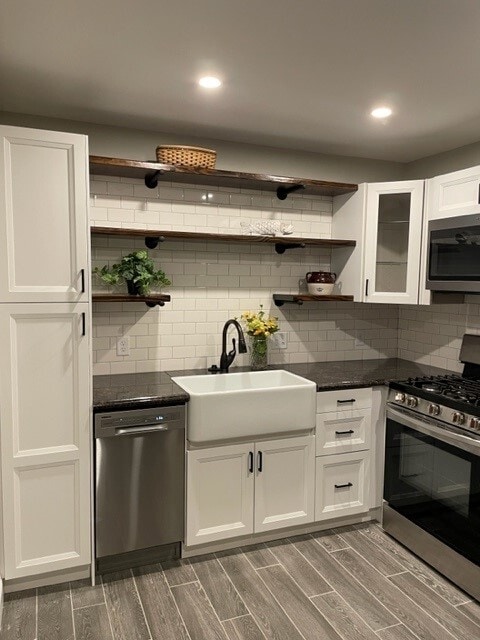 Pantry cabinet, stainless appliances. - 214 E Vermilya Ave