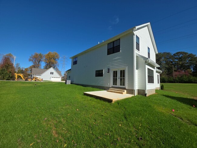 Building Photo - Brand-New 3-Bedroom Home with 2-Car Garage and Maintenance-Free Living