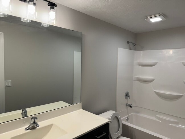 Building Photo - New Construction! West side location. 4br, 3bth, 2crg, Finished basement. All new stainless steel...